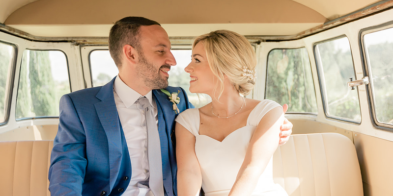 Fee, Editorial Content Specialist at Photobox, sits in a car with her husband on their wedding day, introducing wedding planning tips from a former bride.