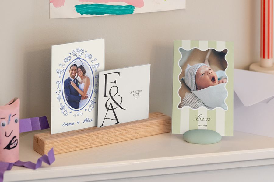Showcasing the variety of custom cards created with Photobox, including a bright save the date, a personalised wedding card, and a birth announcement using easy-to-use card design templates.