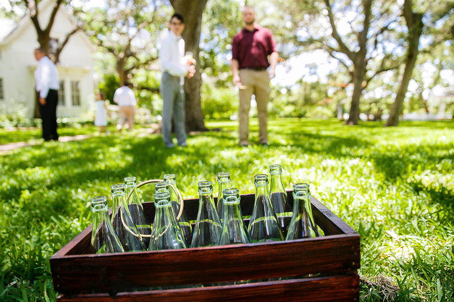 Wedding guests playing ring toss outside at a wedding, inspiring Photobox outdoor wedding games and wedding lawn games for guests.