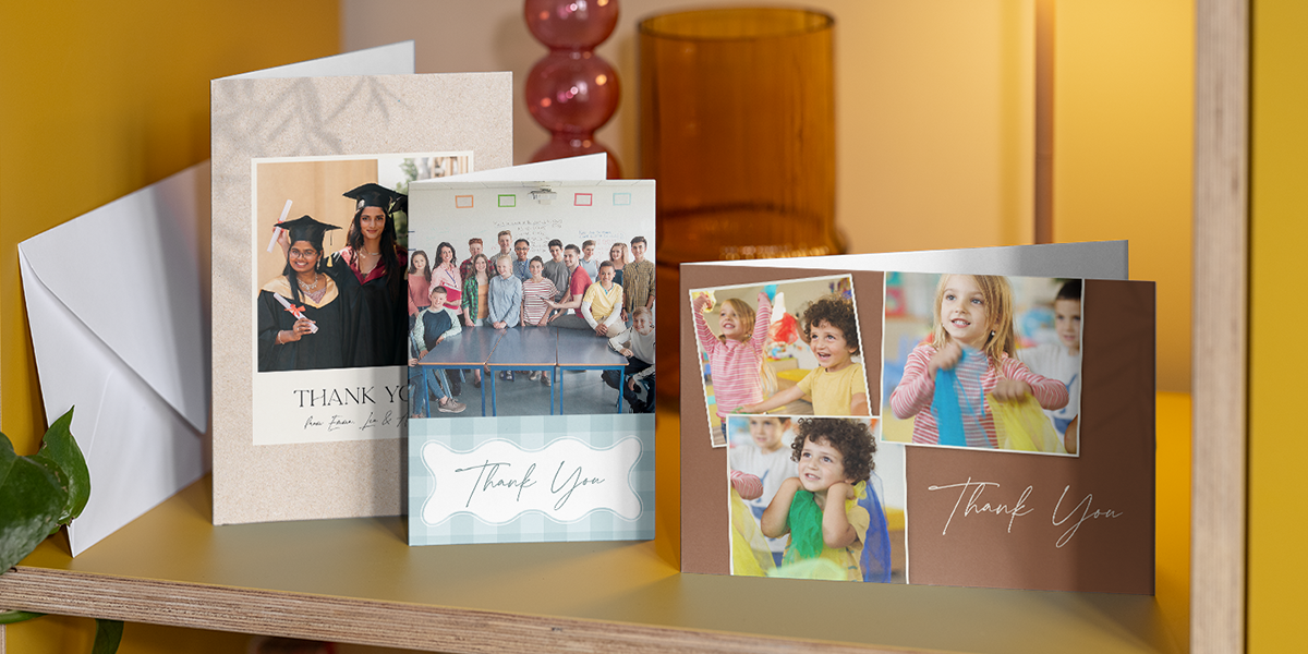 A selection of personalised Photobox thank you teacher cards displayed together on a shelf, inspiring what to write in a thank you teacher card with simple, heartfelt and end-of-term message ideas.