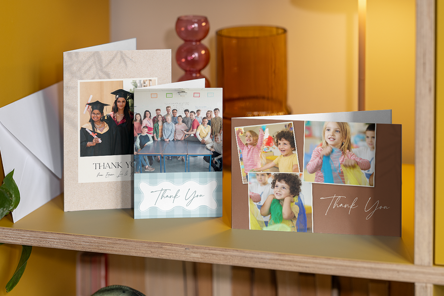 A selection of personalised Photobox thank you teacher cards displayed together on a shelf, inspiring what to write in a thank you teacher card with simple, heartfelt and end-of-term message ideas.