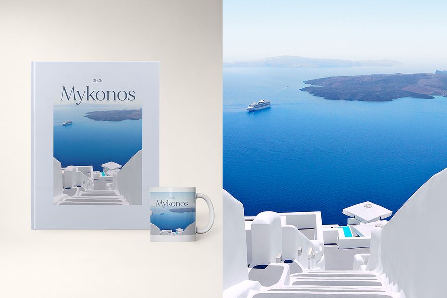 A mug and a personalised photo book titled 'Mykonos', showing an image of the island, in the My Travelogue design from Photobox, where the title, destination and cover colour can all be customised.