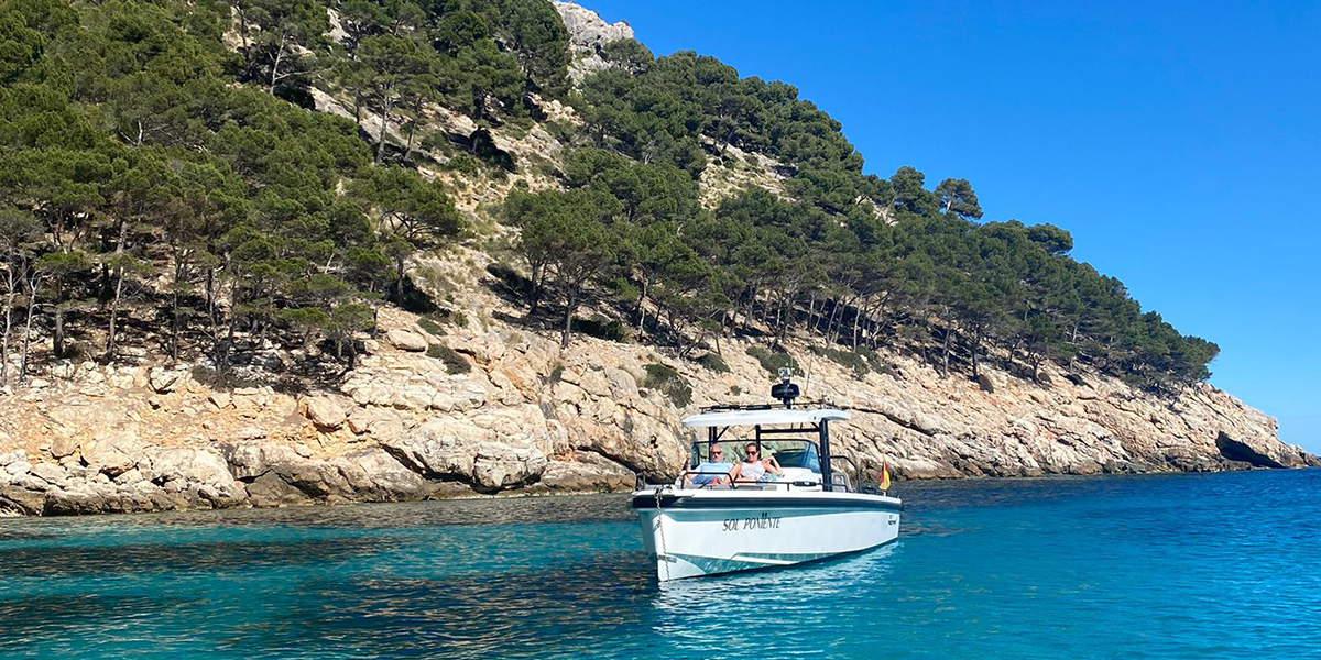 Photobox copywriter Gemma sits on a boat off the coast of Ibiza, introducing her favourite September holiday destinations in Europe.