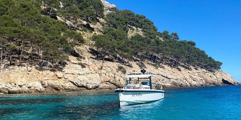 Photobox copywriter Gemma sits on a boat off the coast of Ibiza, introducing her favourite September holiday destinations in Europe.