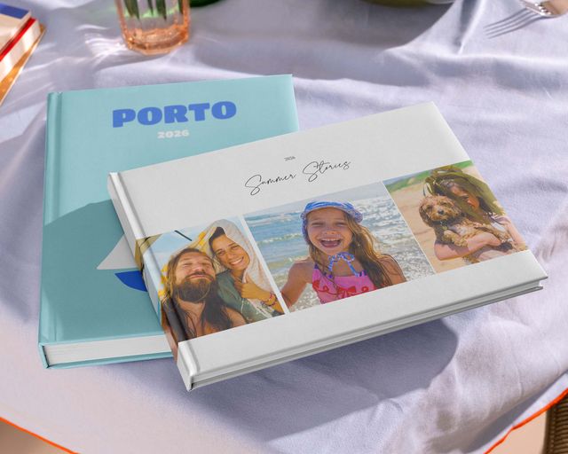 Personalised photo book displaying travel memories and holiday photos.