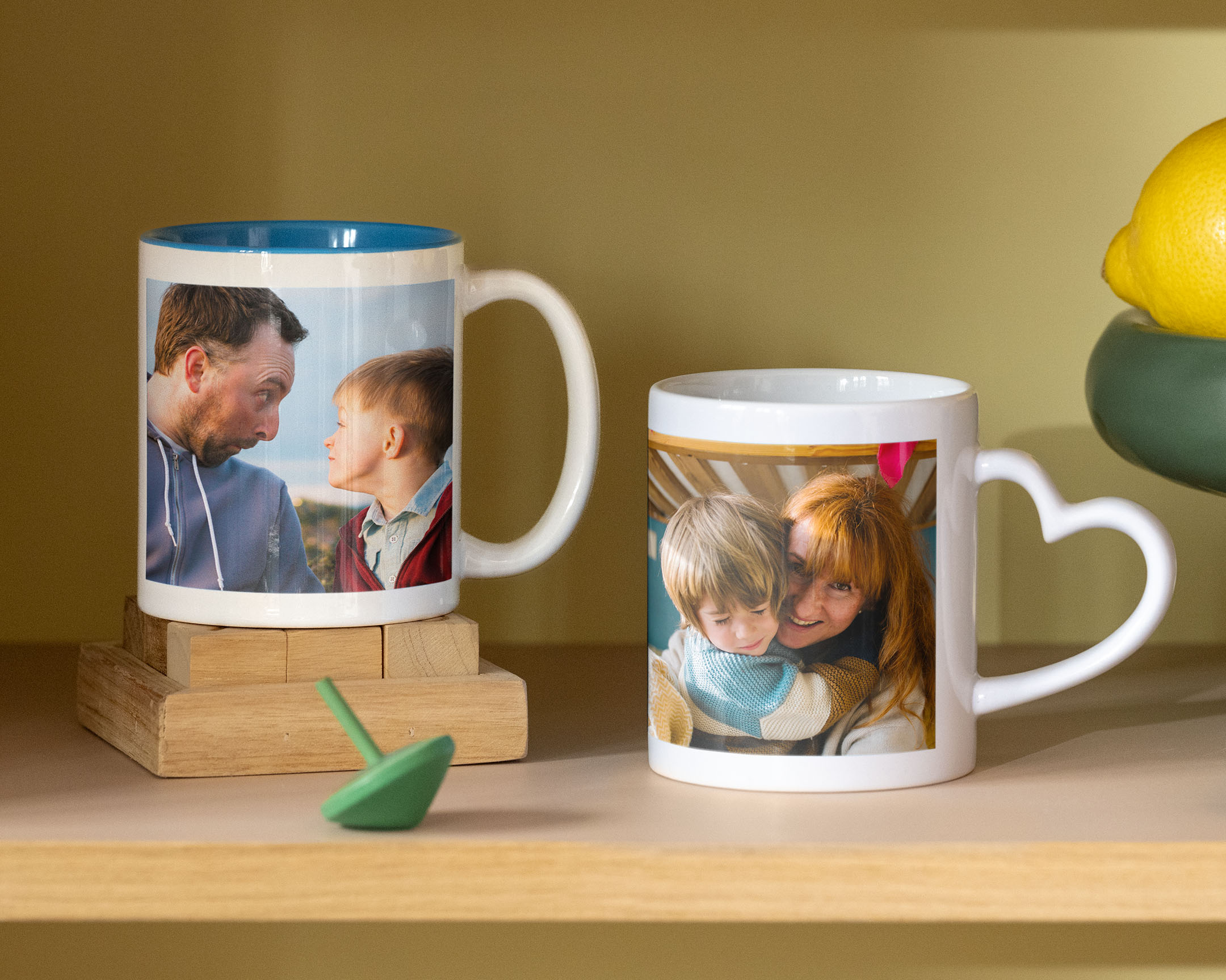 Displayed mugs with family photos on them