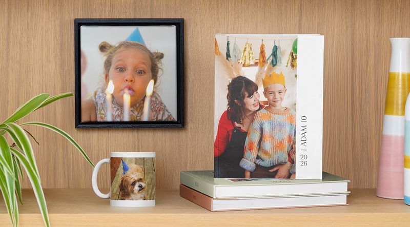 A selection of displayed photo books, wall art and gifts