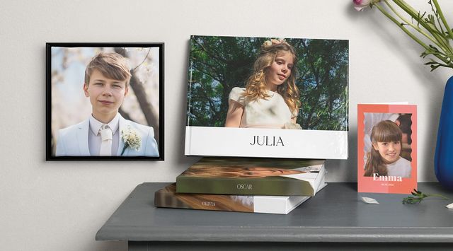 A selection of displayed cards, small photo books and wall art