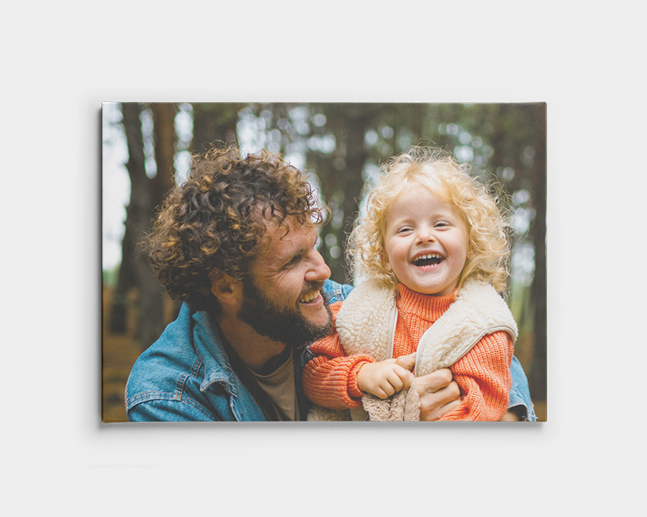 Canvas print with Dad and child smiling in woods