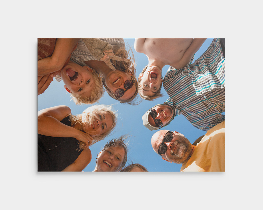 Aluminium print of a group in a circle with blue sky
