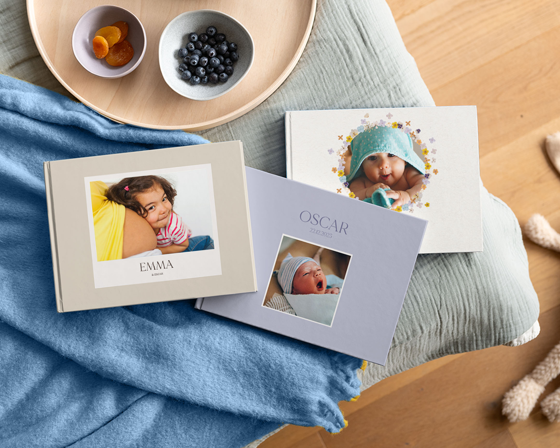 Personalised baby photo books with baby pictures on the covers.