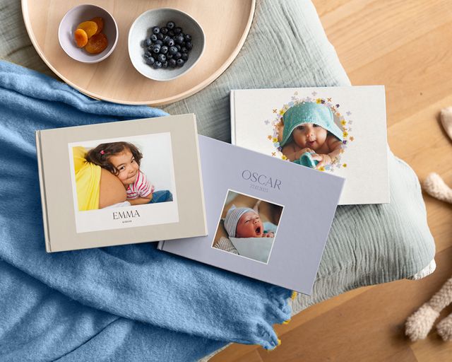 Personalised baby photo books with baby pictures on the covers.