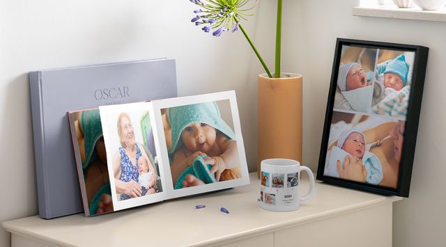 Personalised baby gifts featuring a photo book and framed wall art