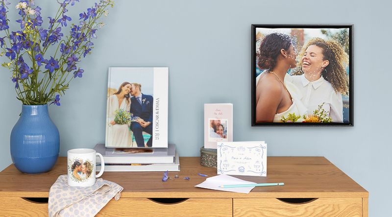 A collection of personalised wedding products, including photo books, photo cards and wall art.