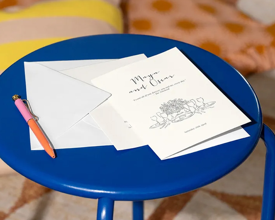 A collection of personalised Photobox wedding invitations in various sizes, illustrating different ways to present wedding wording.